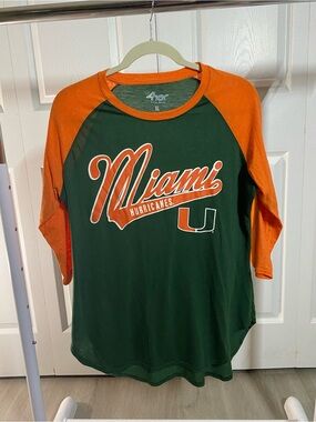 4HER Miami Hurricanes Women’s Green & Orange Raglan Long Sleeve Tee
